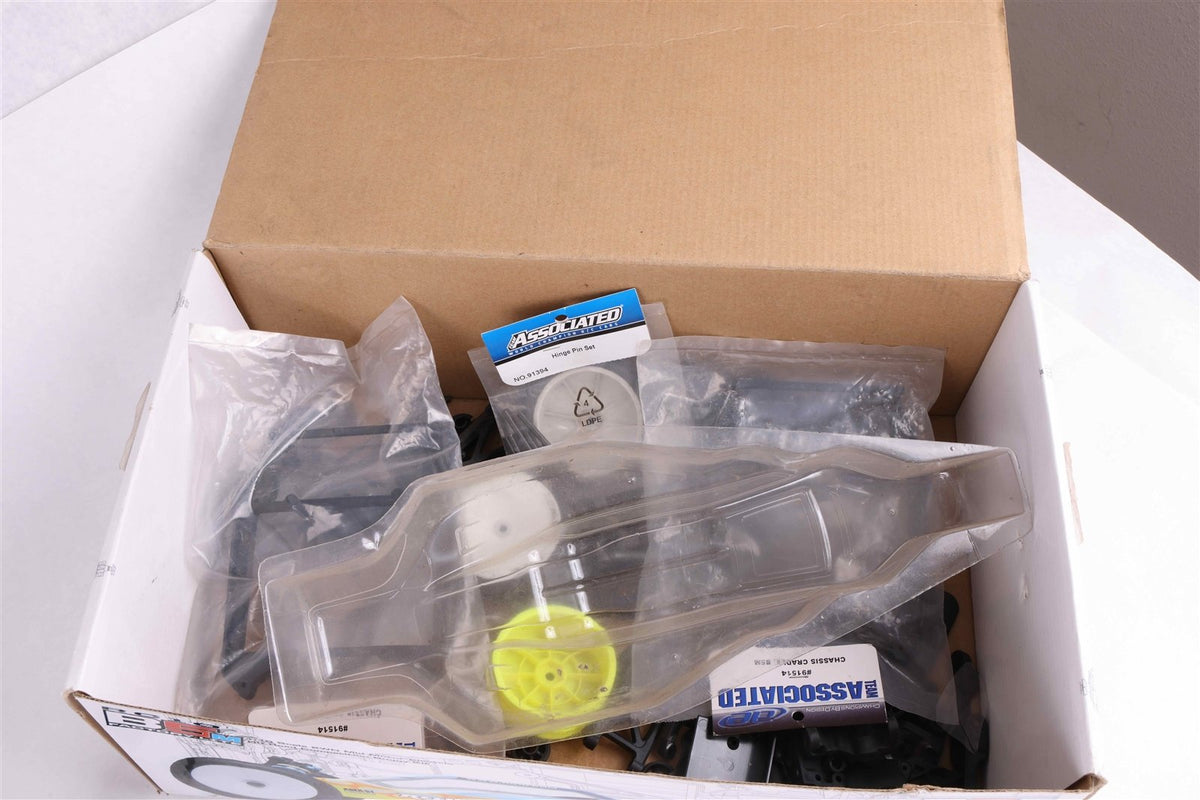2x Team Associated RC10B5M - One Complete One In Pieces -Plus box of parts